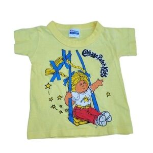 Vintage 1980s-1990s swinging Cabbage Patch Kids Doll yellow t-shirt